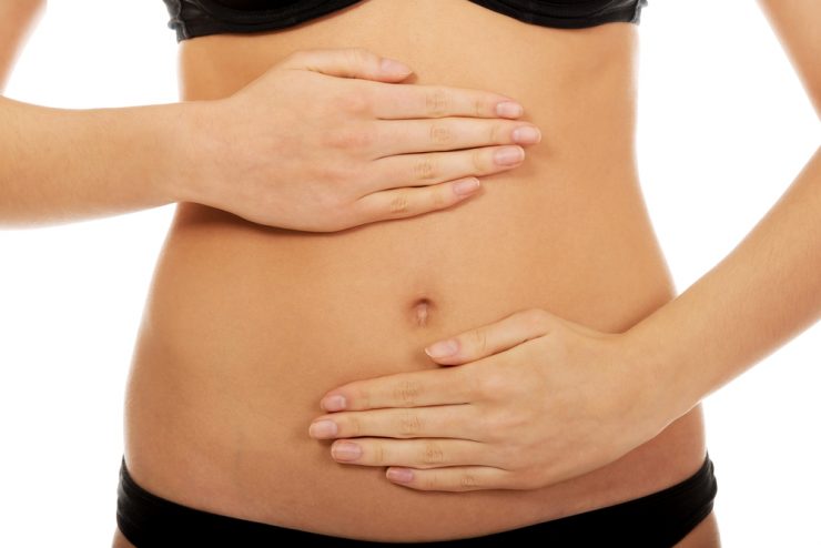 Close up of a woman's stomach to represent gut health