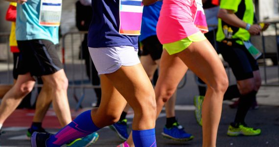 close up of runners in the marathon