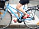 Close up of woman cycling to work