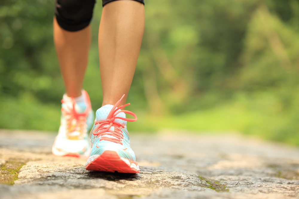 Close up of woman's trainers while out walking