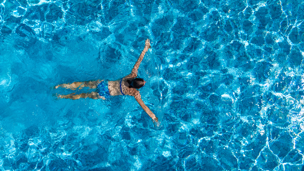 Aerial view of a woman swimming