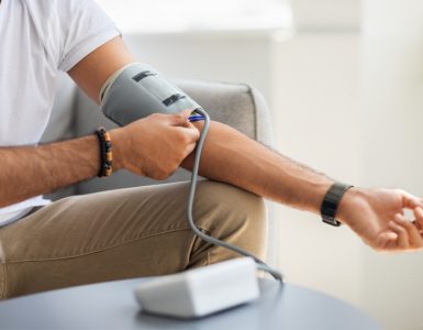 Close up of man taking blood pressure reading