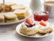 A traditional afternoon tea with close up of scone